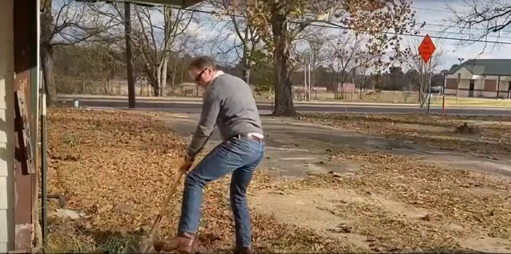 Chris digs for red spider lilies