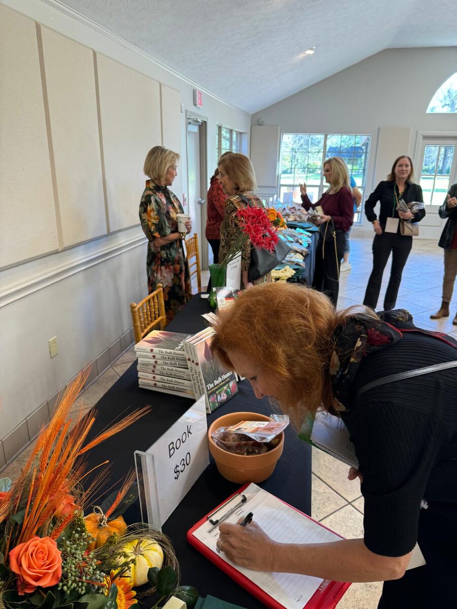 Guests sign up for the newsletter at the welcome table