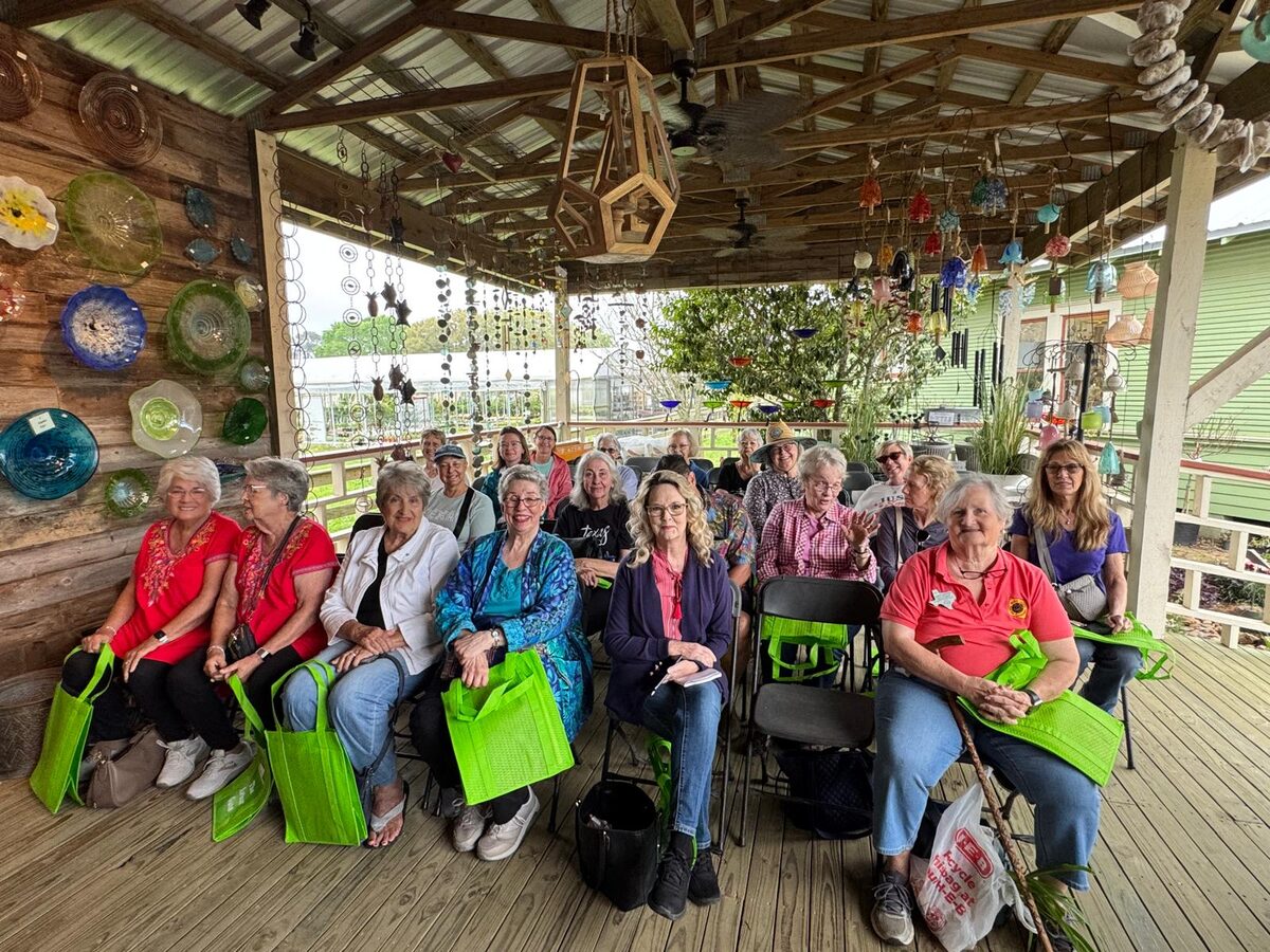 A tour group ready with bulbs in hand